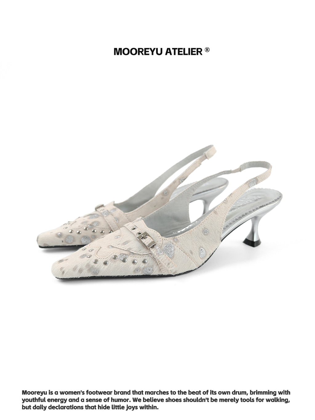 Cream beige MOOREYU ATELIER spotted horsehair slingback pumps, 6cm thin stiletto pointed heels with silver rivet buckle, front view on white background